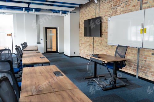 Preview: Empty room with tables and chairs for studying. University or school auditorium. Furniture in the