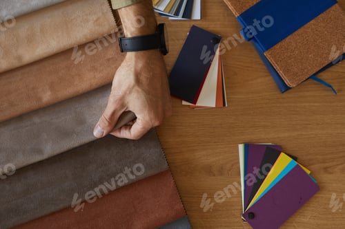 Preview: Fashion designer working with patterns