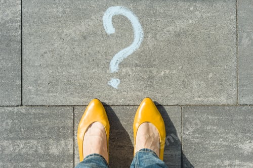 Preview: Woman feet with question mark in front of her legs painted on the asphalt