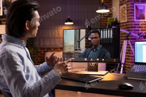 Preview: Male Colleagues Discussing Project on Video Call