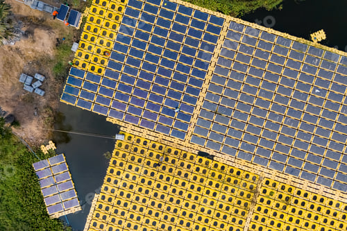 Preview: Renewable Energy Eco Technology Electric Power. Floating solar panels on lake.