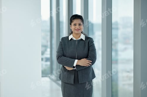 Preview: Smiling Businesswoman Standing In Office
