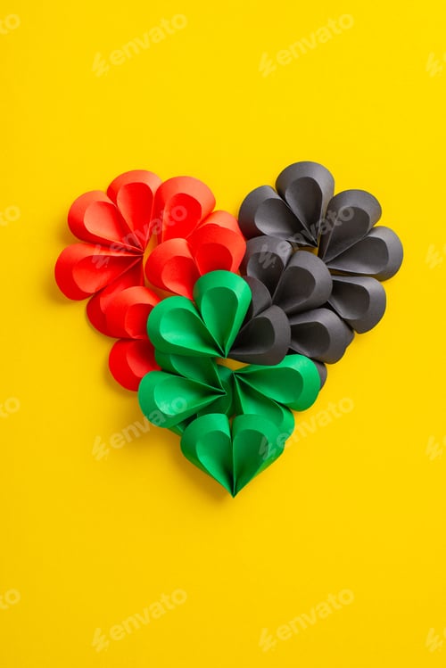 Preview: A vibrant vertical display of paper hearts in red, green, and black
