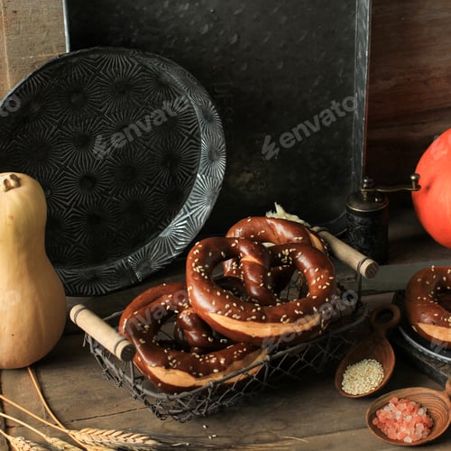 Preview: German Brezel pretzel with salt on wooden background