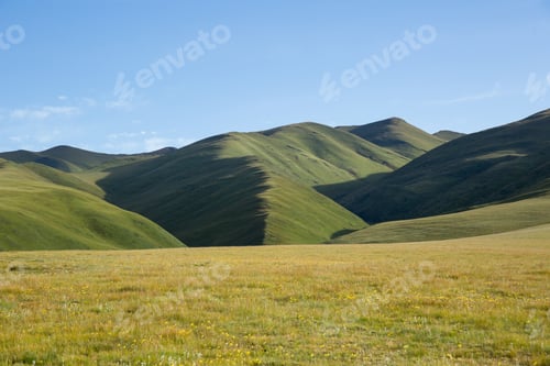 Preview: High altitude mountains with grassland landscape