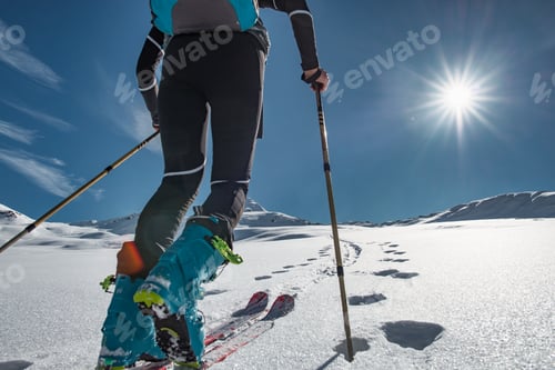 Preview: Ski mountaineer climbs on tracks with sealskin