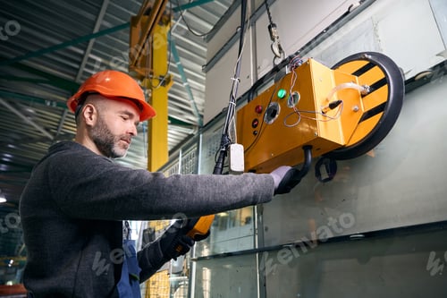 Preview: Worker uses modern equipment in a production workshop