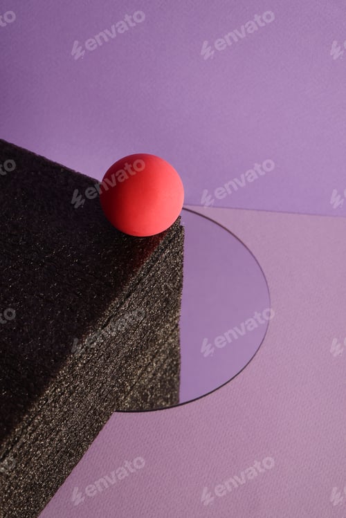 Preview: dimensional compositions of geometric shapes concept. purple ball on textured box and mirror