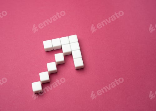 Preview: Arrow made of blocks on a gray background. Set a course. Leadership skills.