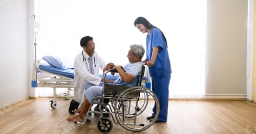 Preview: Doctor and nurse taking care of adult patient at hospital room.