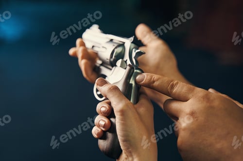 Preview: Female learning to handle a gun assisted by a certified instructor