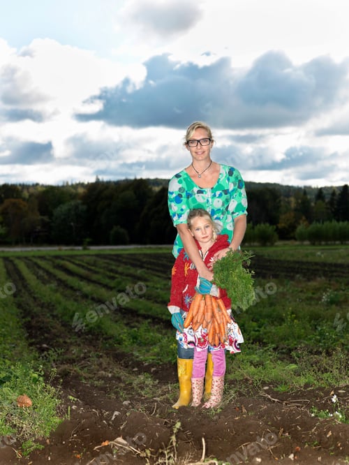 Preview: Mother and daughter on field