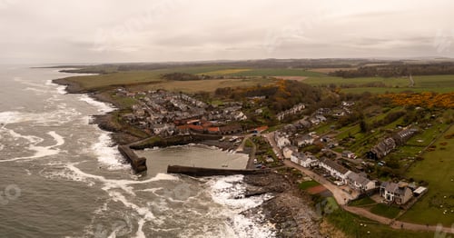 Preview: Aerial landscape view of Craster Harbour and village in Northumberland