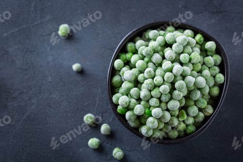 Preview: Frozen green peas in a bowl