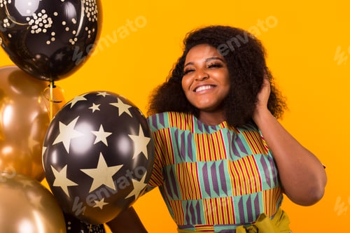 Preview: Holidays, party and fun concept - Portrait of smiling young African-American young woman looking