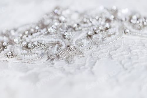 Preview: Beautiful details of a wedding dress beadwork close-up