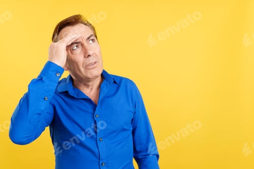 Preview: Mature man gesturing that he is forgetting something