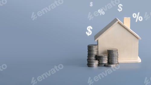 Preview: A stack of coins with house model isolated on grey background with copy space.