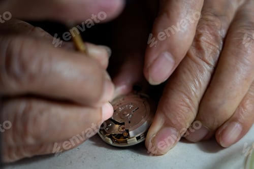 Preview: Watchmaker is repairing the mechanical watches in his workshop