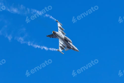 Preview: Fighter Jet Climbing with Vapor Trail in Sky