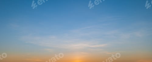 Preview: Morning sky scene with a bright golden light. Beautiful sunrise with clouds soft. Nature background