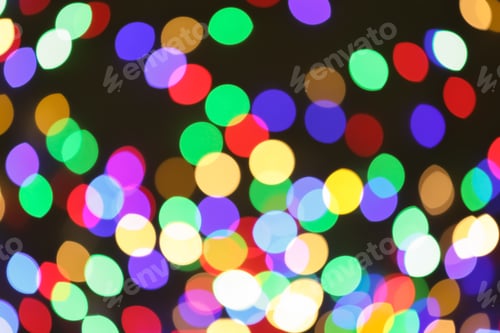 Preview: Beautiful colorful lights on dark background. Bokeh effect