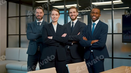Preview: Smiling people in a suit in the office. Business people looking at camera