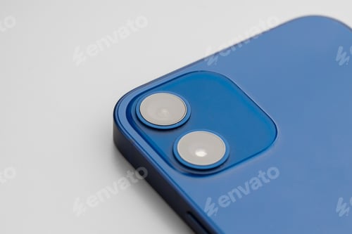 Preview: Blue modern smartphone with double-lens camera on gray background