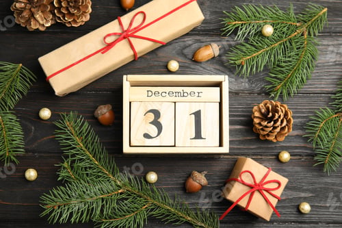 Preview: Flat lay composition with block calendar on black wooden table