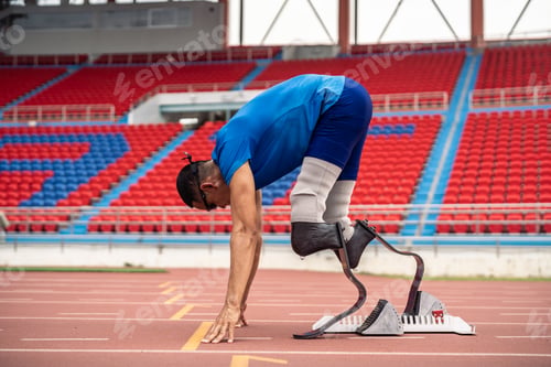 Preview: Asian athletes are disabled with prosthetic blades running at stadium.