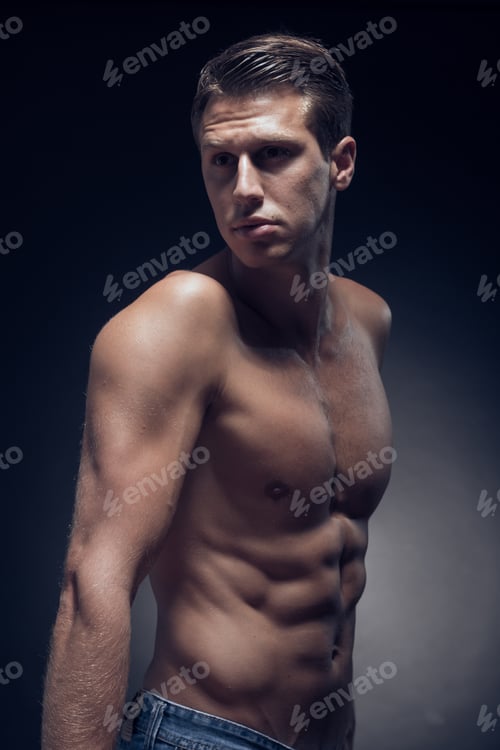 Preview: One Young Adult Man, Caucasian, Fitness Model, Muscular Body, Shirtless, Jeans, Black Background