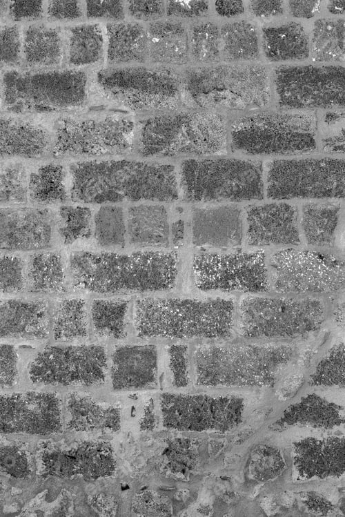 Preview: Rough Porous Texture Of Stone Bricks Of An Old And Ancient Wall Of Monochrome Tone