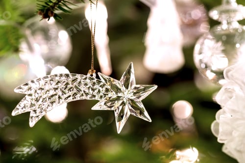 Preview: Fir branch with transparent Christmas decoration