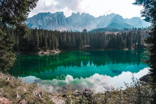 Preview: Beautiful high mountains in Italy with the cloudy sky in the background