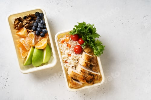 Preview: Lunch box with chicken, rice, vegetables, tomatoes, salad, fruits