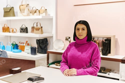 Preview: Woman working clothing and accessories boutique