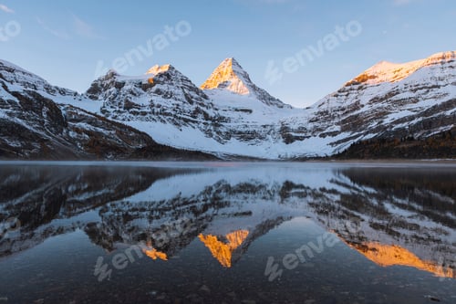 Preview: Golden hour at a serene mountain lake