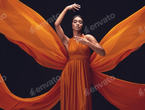 Preview: Portrait, creative and woman with dress, movement and beauty against a dark studio background. Face