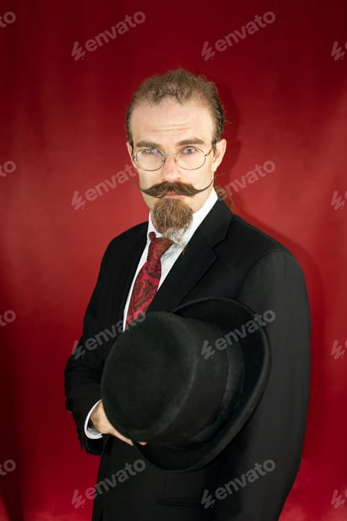 Preview: Vintage Caucasian Magician with top hat, glasses and mustache posing