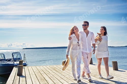 Preview: Young adults walking on pier, Gavle, Sweden