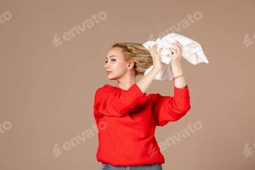 Preview: front view young female taking towel off her head on pink background mask woman skincare cream