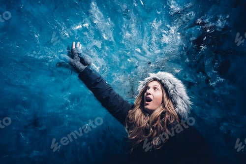 Preview: Woman behind pure blue ice