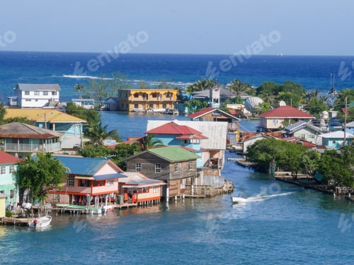 Preview: Aerial view of many houses along the canal on Roatan Island in summer