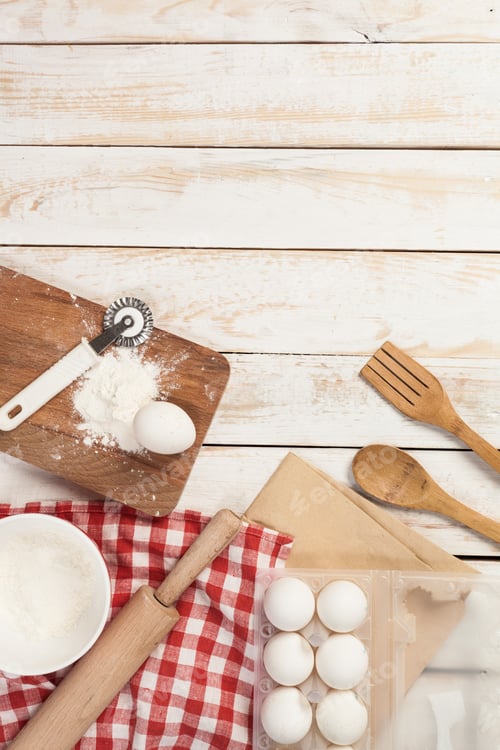 Preview: baking preparation, top view of a variety of baking utensils and ingredients