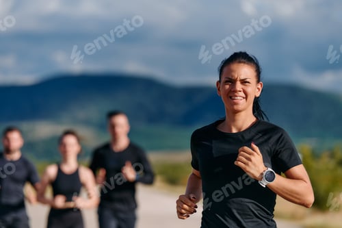 Preview: Leader Guiding Athletes on a Sunny Day Run