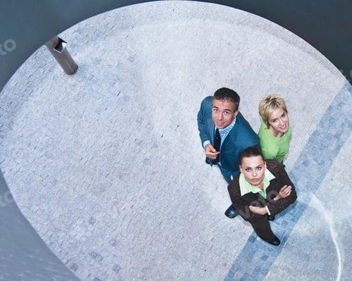 Preview: Business people standing together