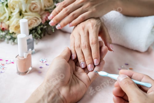 Preview: Elegant Woman Having Manicure Treatment At Home