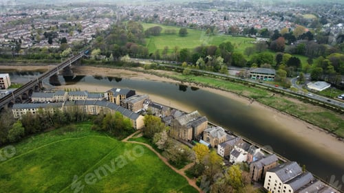 Preview: Shot of a bridge spanning across the River Lune, with lush green hills