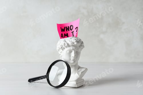 Preview: Lens, ancient head and note with text on light background
