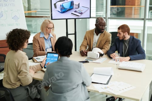 Preview: Several coworkers in formalwear discussing working points and networking